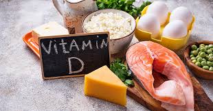 vitamin d sign with cheese eggs pea bread fish